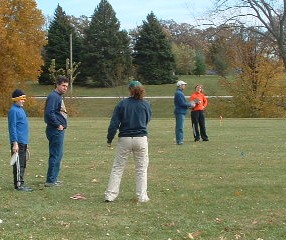 Tracey Lopez helping teach new players fundamentals at a local disc golf clinic at Middle Park 2006